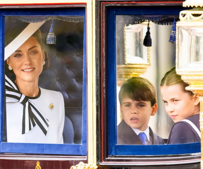 Princess Kate, Prince Louis and Princess Charlotte in a carriage