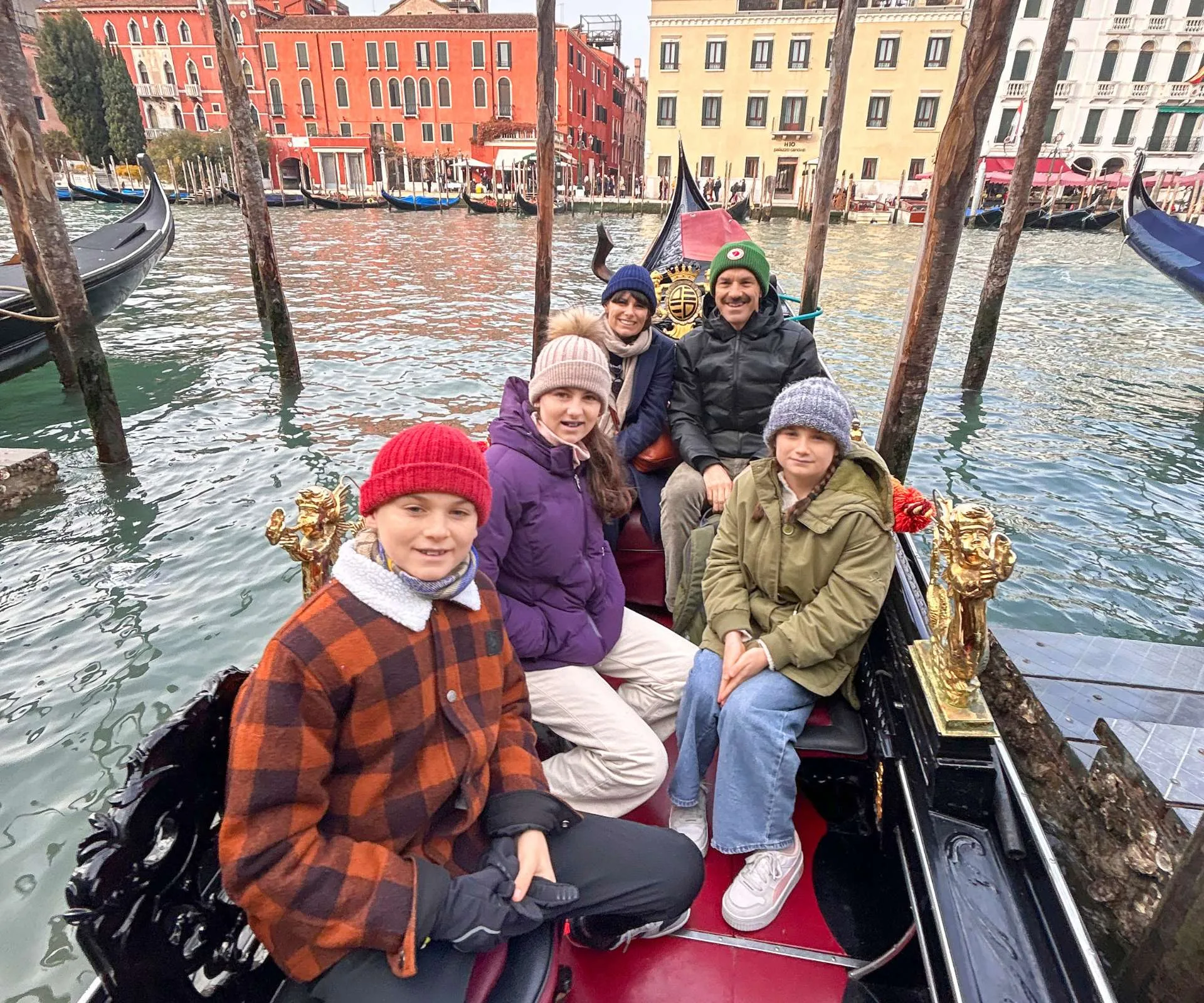 Hadyn with his family in a boat