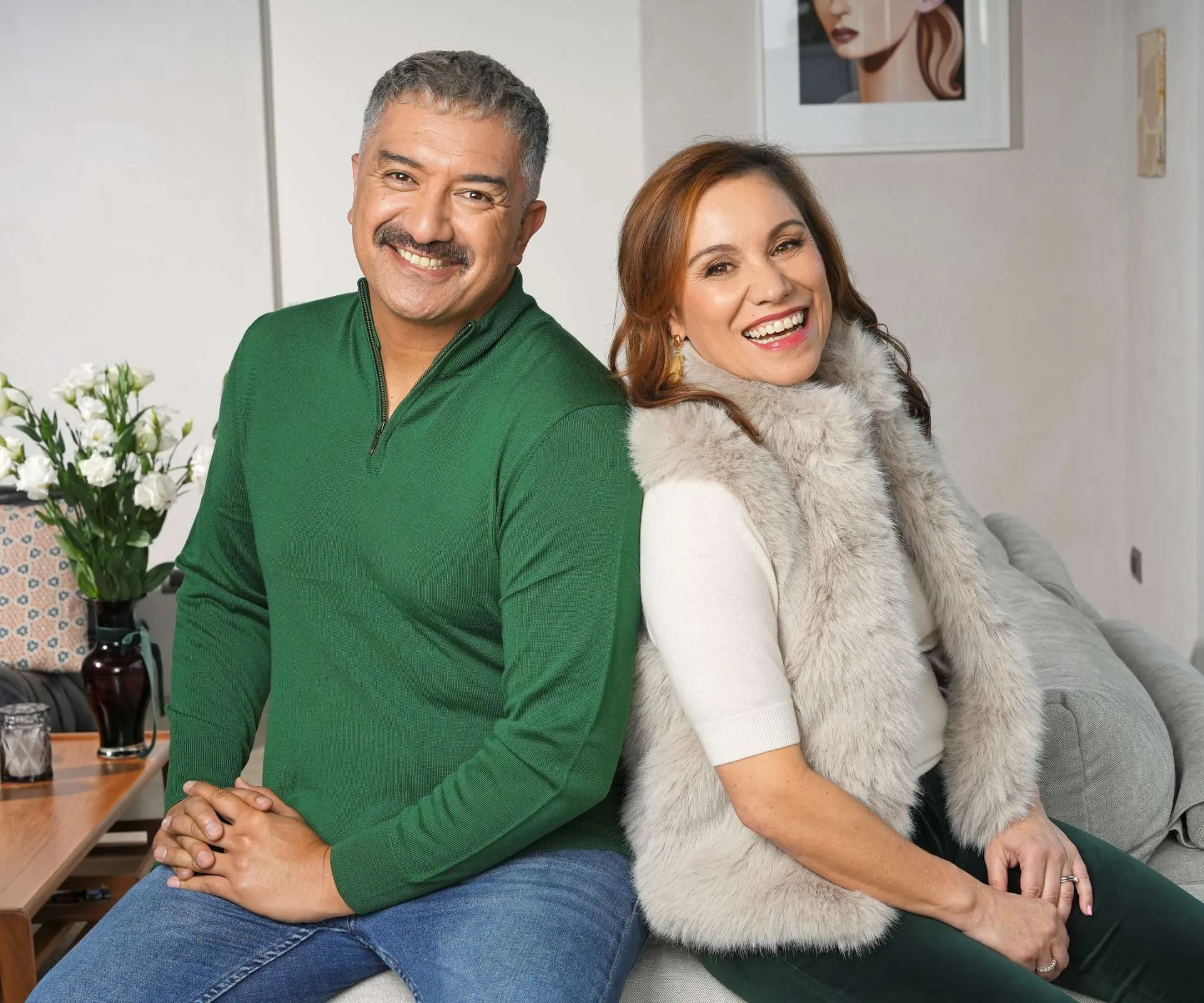 Matariki TV broadcasters Stacey Morrison and Mātai Smith sitting back-to-back