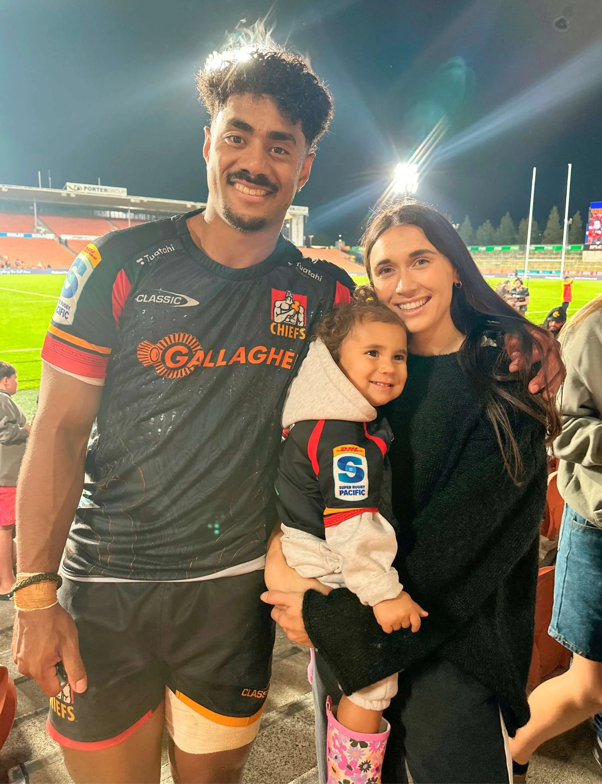 Danielle, Milla and Emoni in the stands after one of his Chiefs games