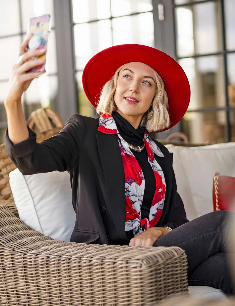 Holly Shervey taking a selfie on The Brokenwood Mysteries