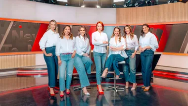 The Newshub women standing in front of the news desk