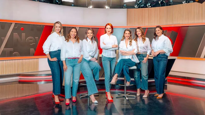 The Newshub women standing in front of the news desk