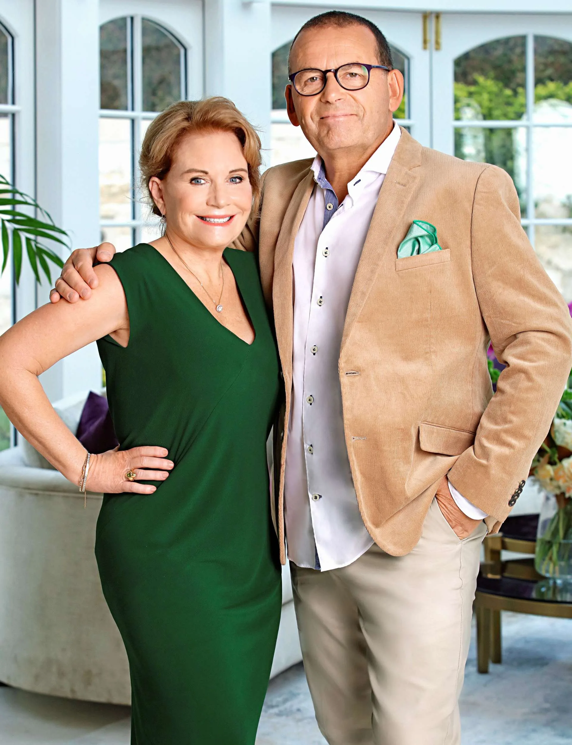 Paul Henry with his arm around wife Diane's shoulder