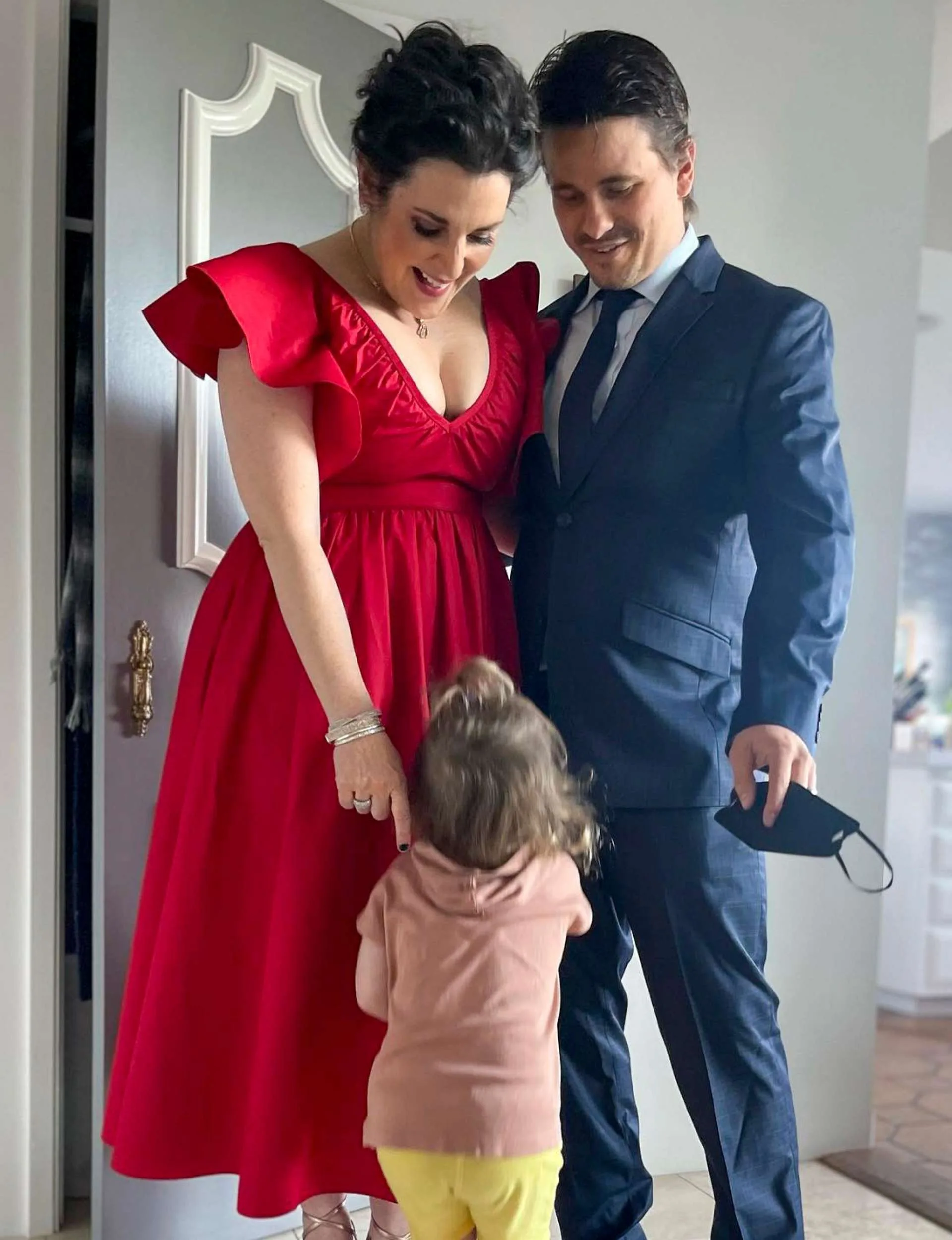 With husband Jason and daughter Kahikatea looking up at them