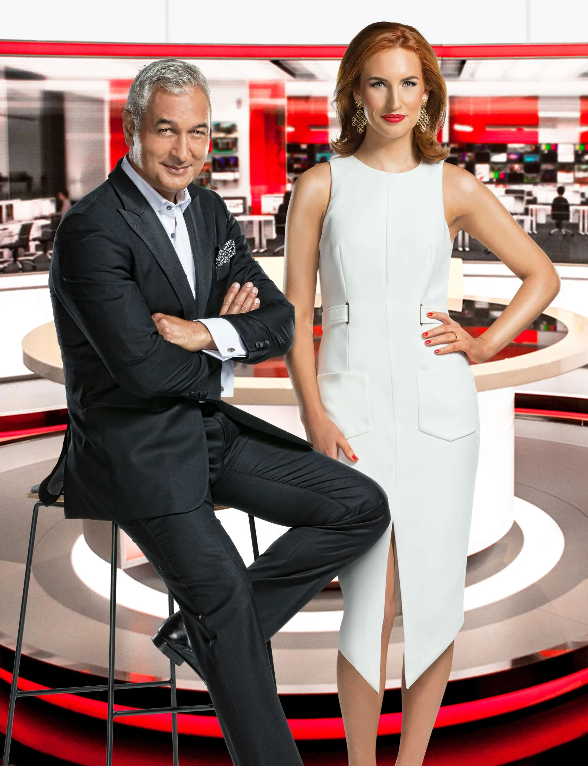 Press image of Samantha Hayes and Mike McRoberts in the newsroom