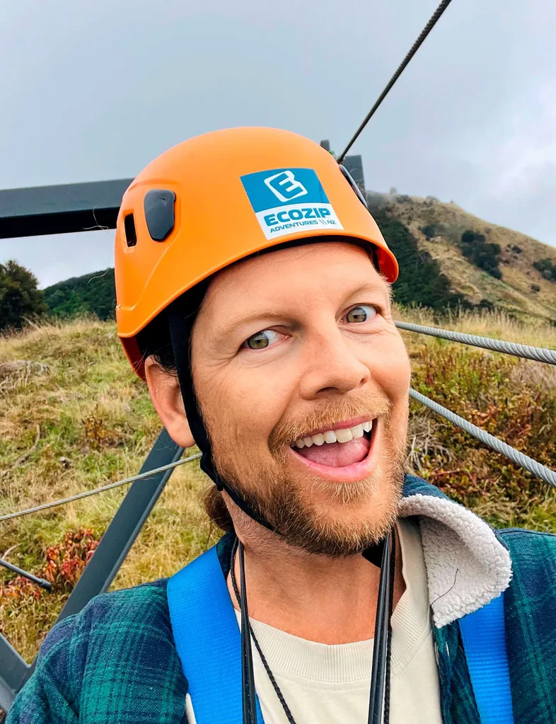 Editor Sebastian wearing a ziplining helmet