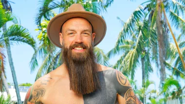 MAFS groom Mike in front of tropical trees
