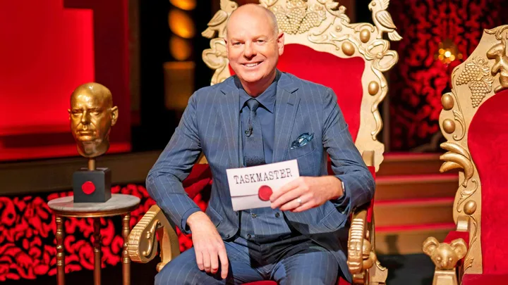 Taskmaster host Tom sitting in his throne