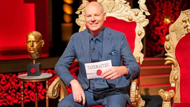 Taskmaster host Tom sitting in his throne