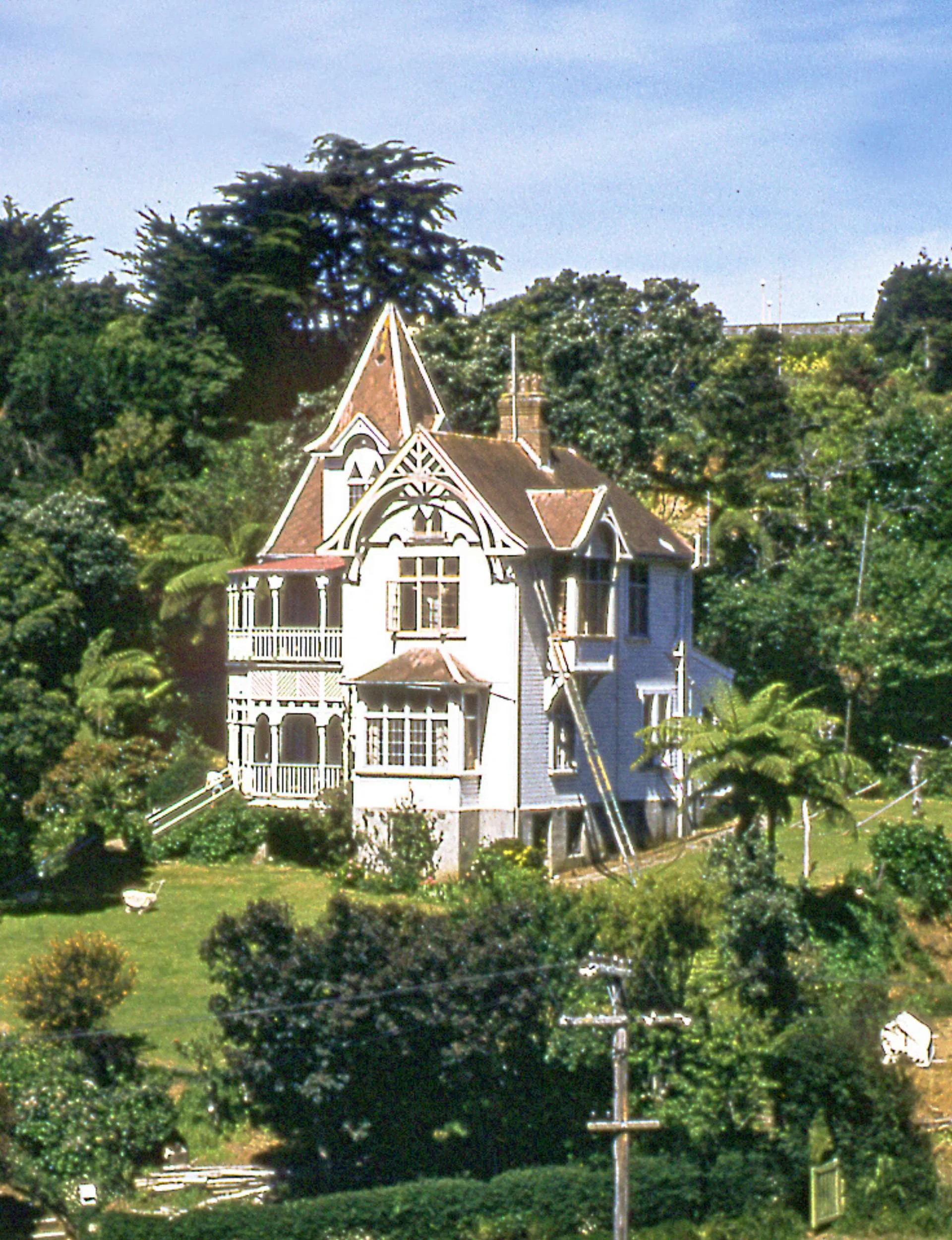 A white castle-like house on a hill
