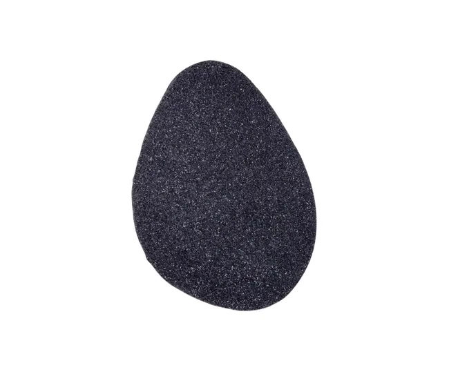 A black exfoliating stone for feet care