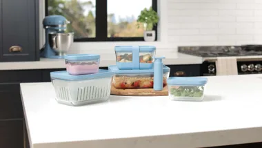 New World giveaway containers on a kitchen bench