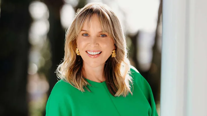 Angela Bloomfield in a green dress