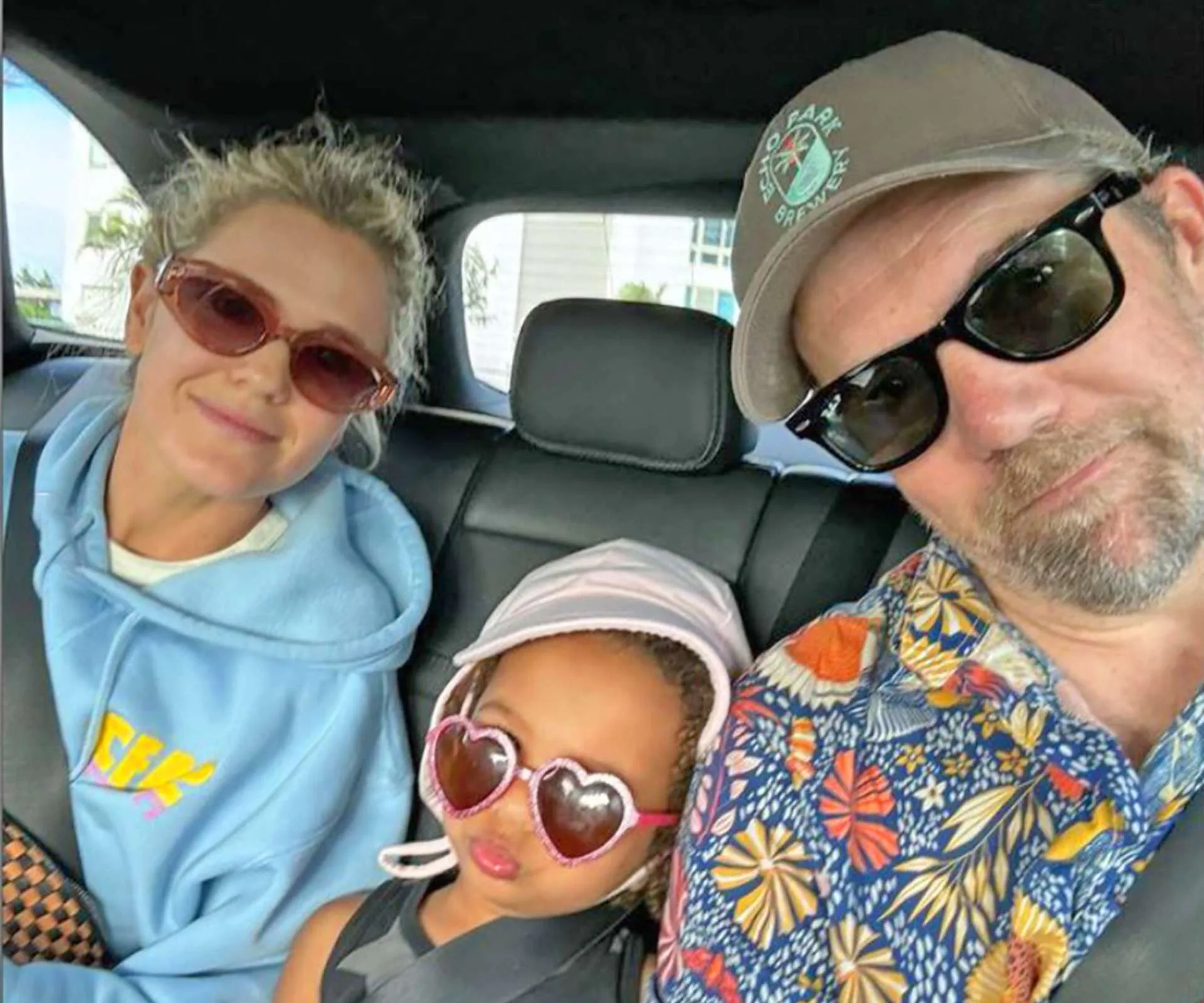A selfie in the car of Harriet, Patrick and daughter Joni