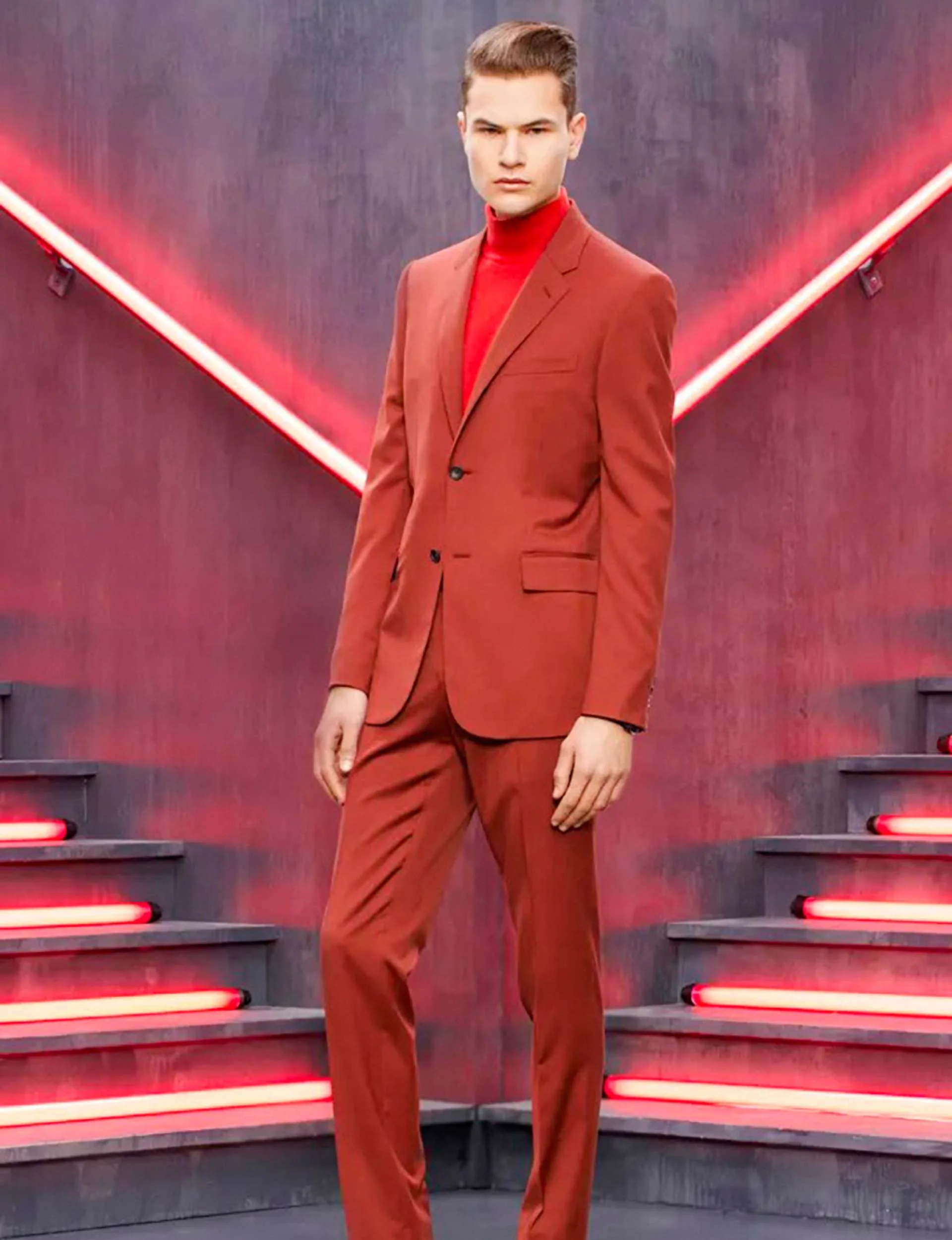 Michael modelling in a red suit