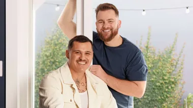 Ben Blackwell and partner Alex in a doorframe