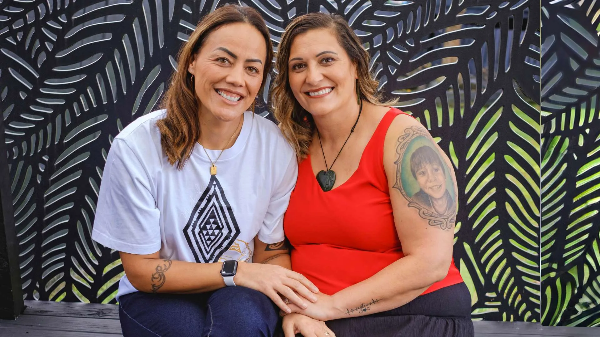 Honey and Rochelle sitting on a bench together