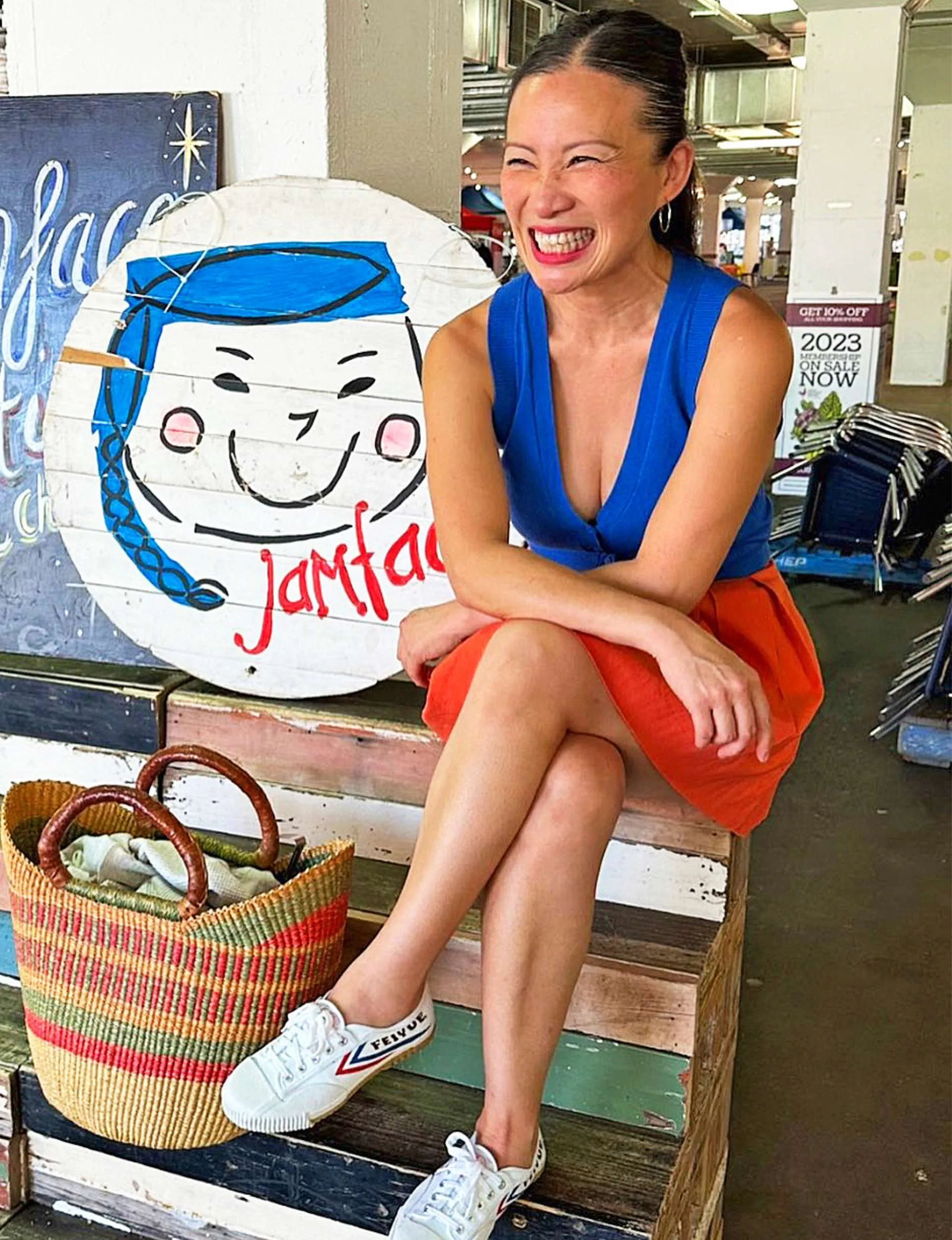 MasterChef judge Poh Ling Yeow sitting on wooden stairs