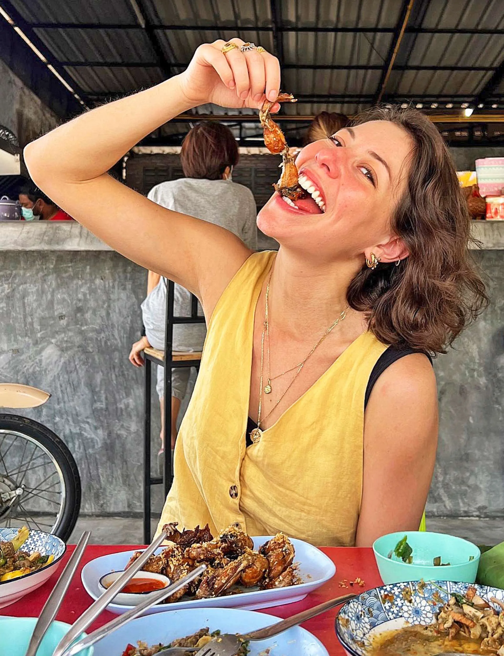 Sofia Levin dangling food into her mouth