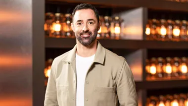 MasterChef judge Andy Allen standing in the kitchen
