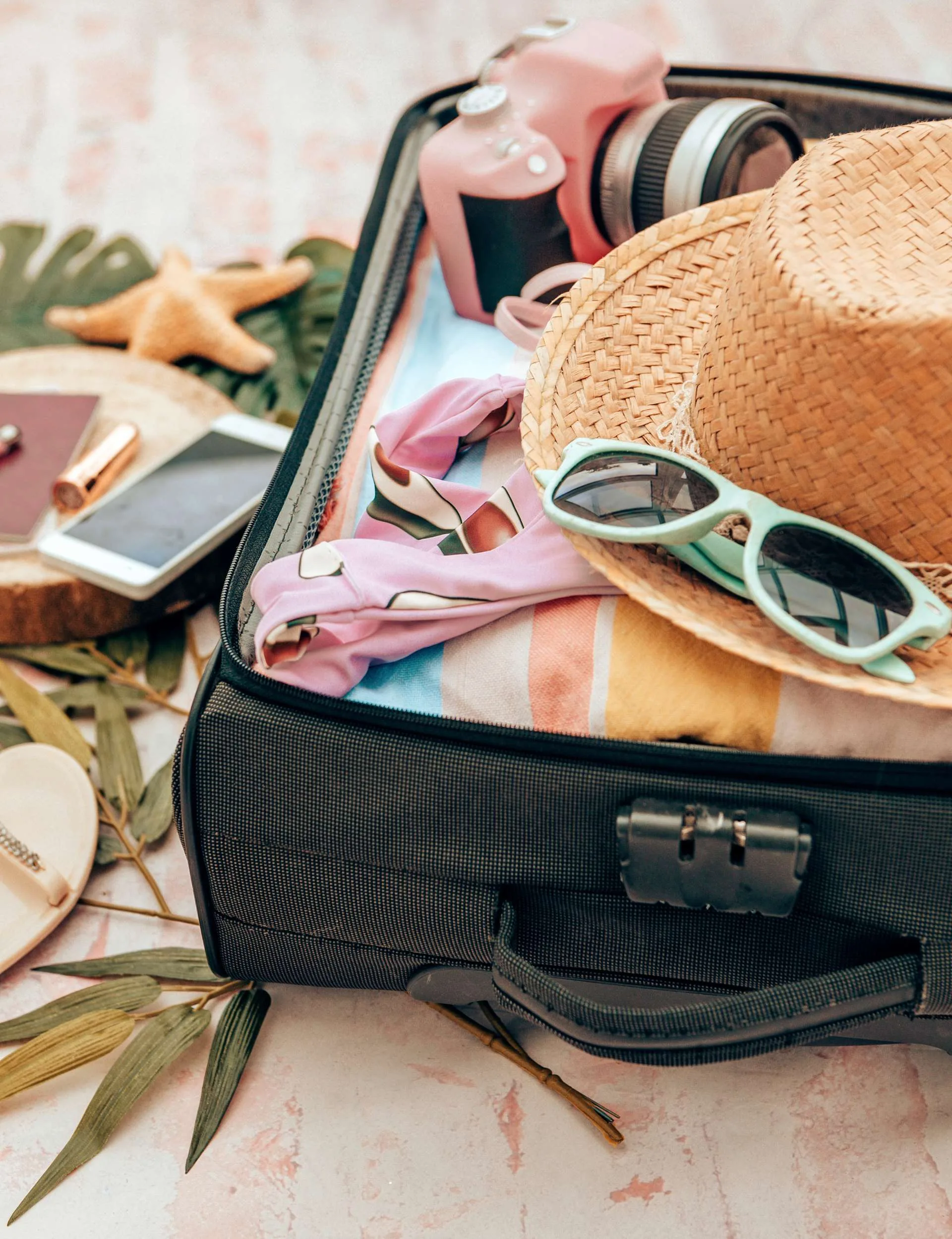 Packed suitcase ready for a tropical holiday destination