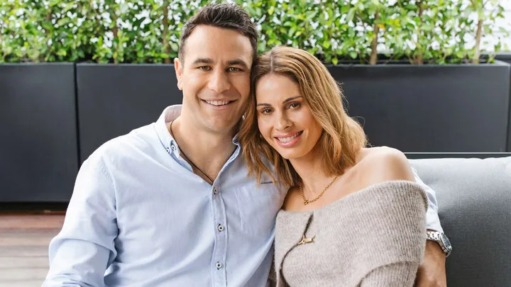 Wilhelmina and Ben on an outdoor couch together