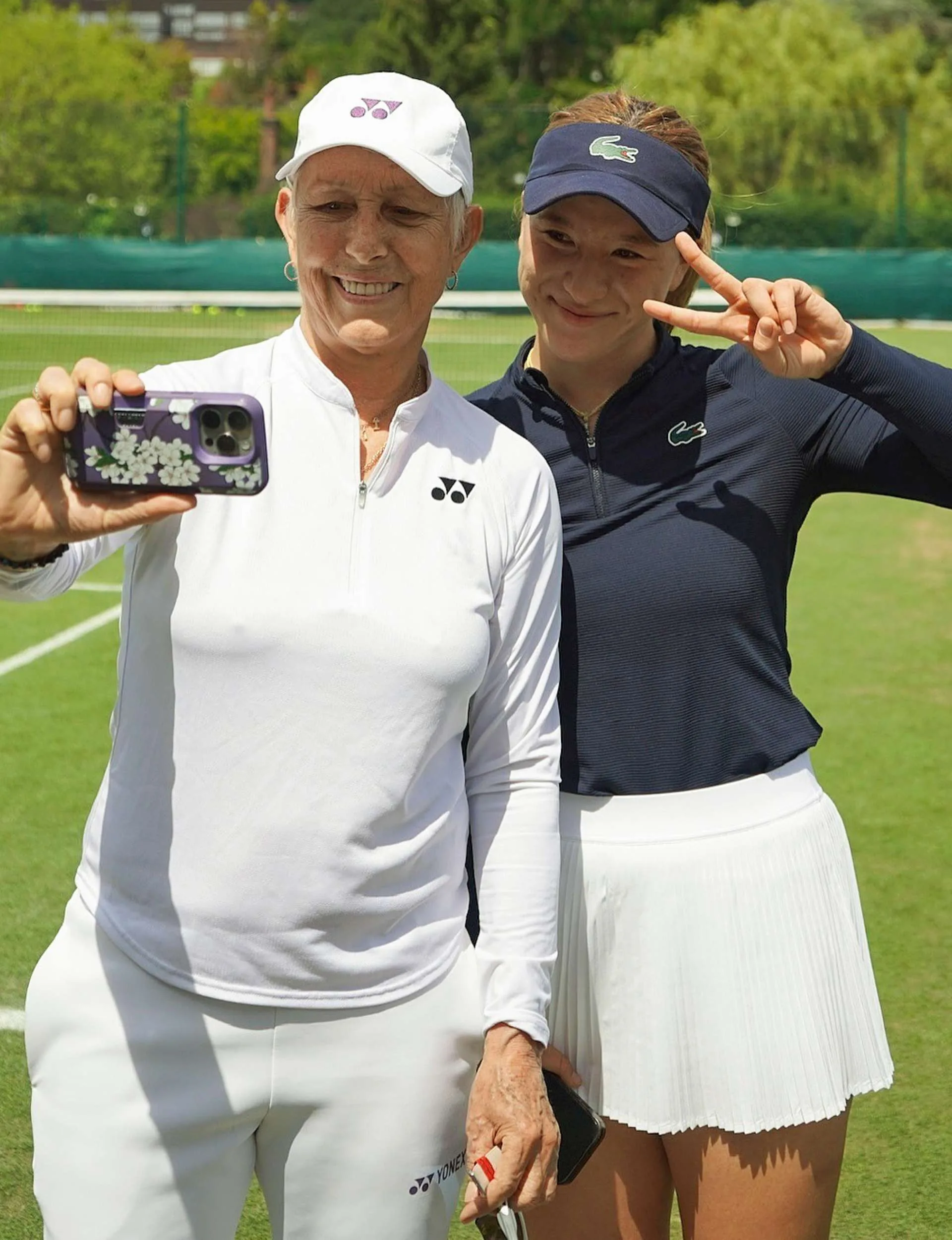 Martina Navratilova taking a selfie with Lulu Sun