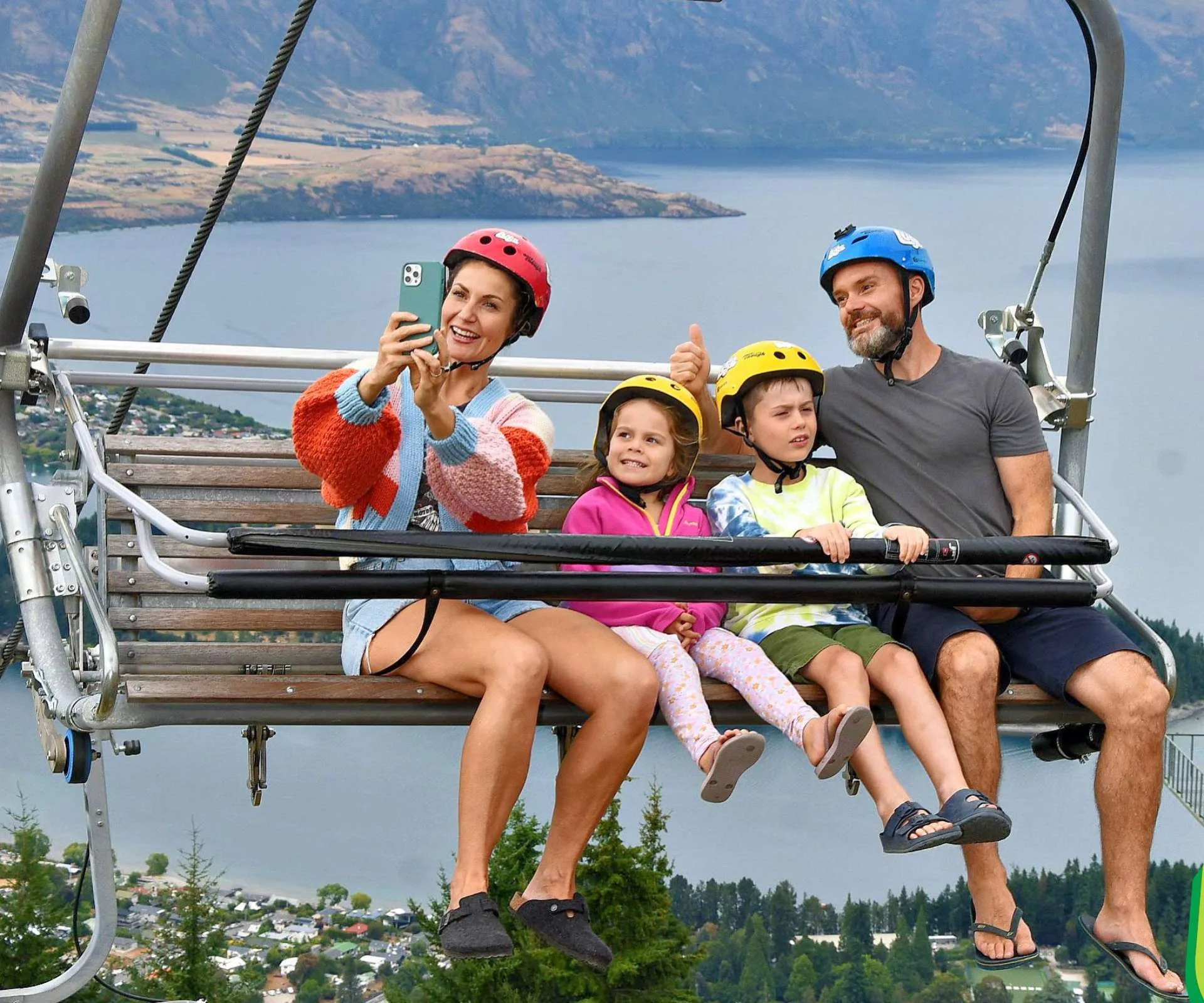 Nick and Sophie with their kids on a gondola