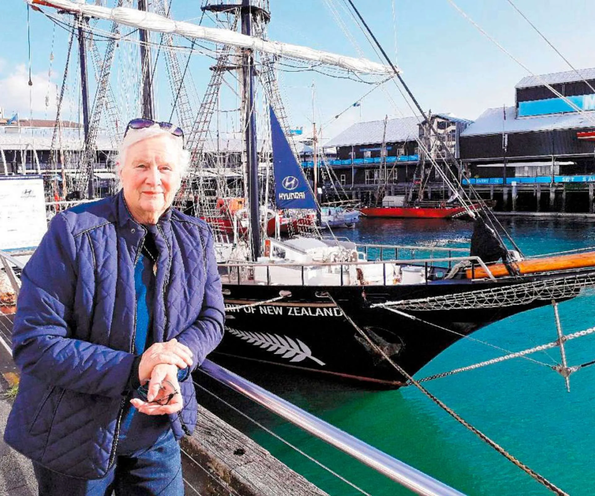 Tessa in front of the Spirit of New Zealand ship