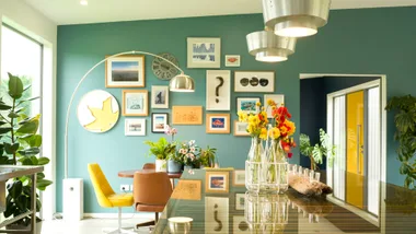 The gallery wall, painted in Resene Half Smalt Blue, in Invercargill home