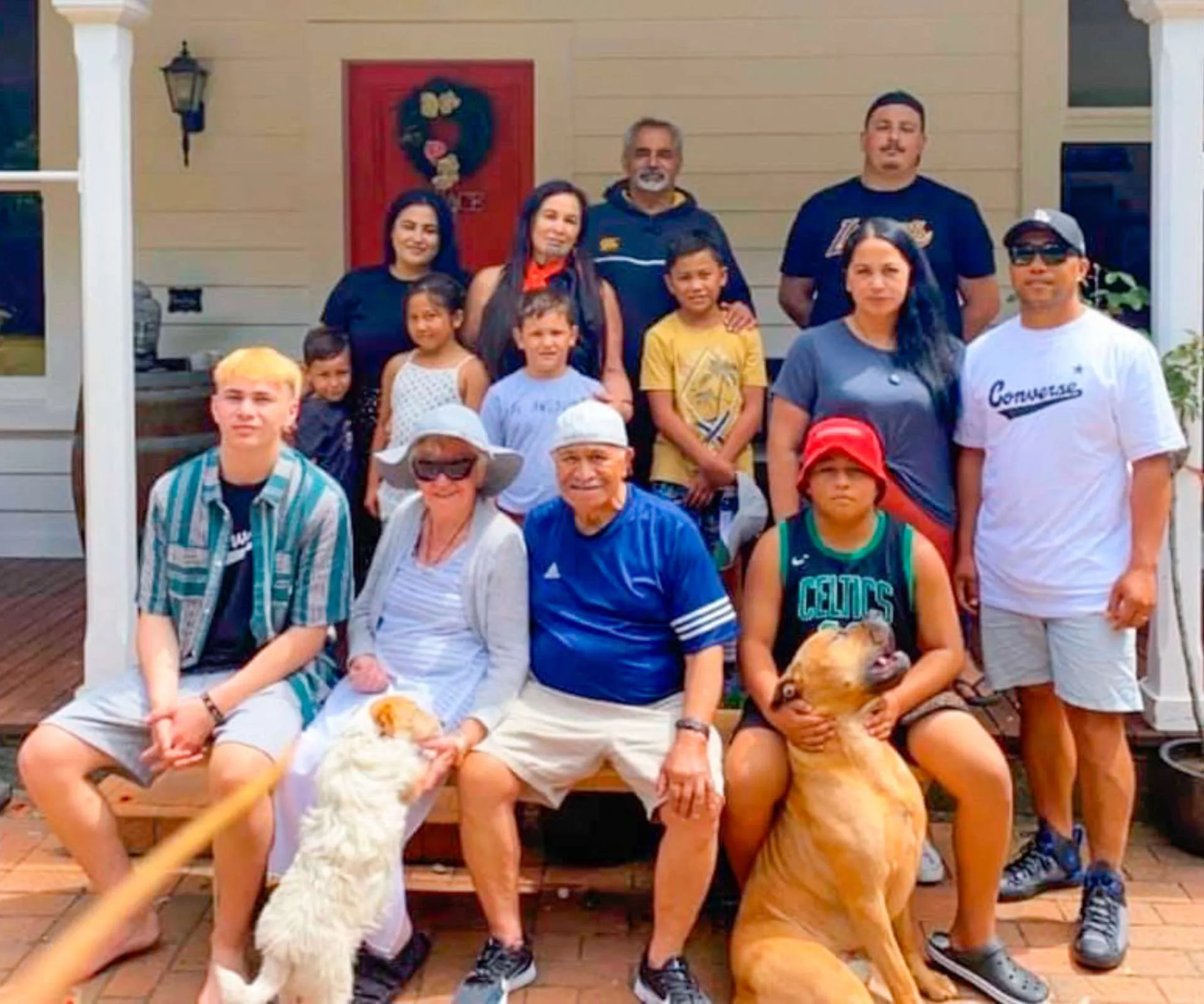 The Ngarewa-Packer family in front of a home