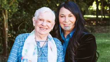 Debbie Ngarewa-Packer standing behind mum Colleen's shoulder