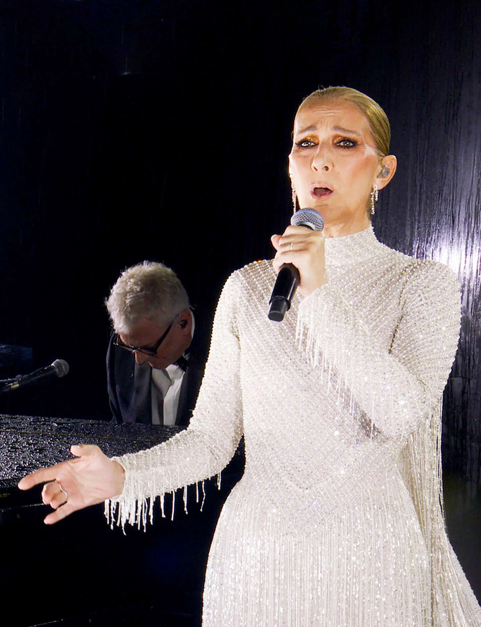 Cèline Dion performing at the Olympics opening ceremony