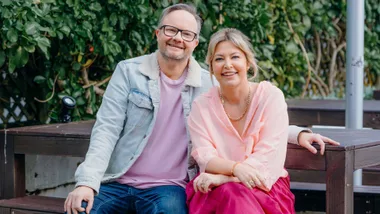 Sarah and Flynny sitting at an outdoor table