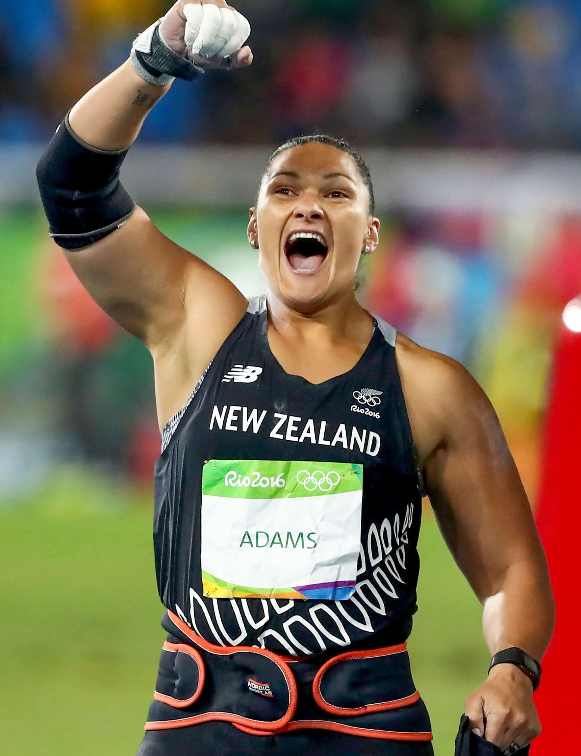 Valerie Adams celebrating after winning an Olympic medal