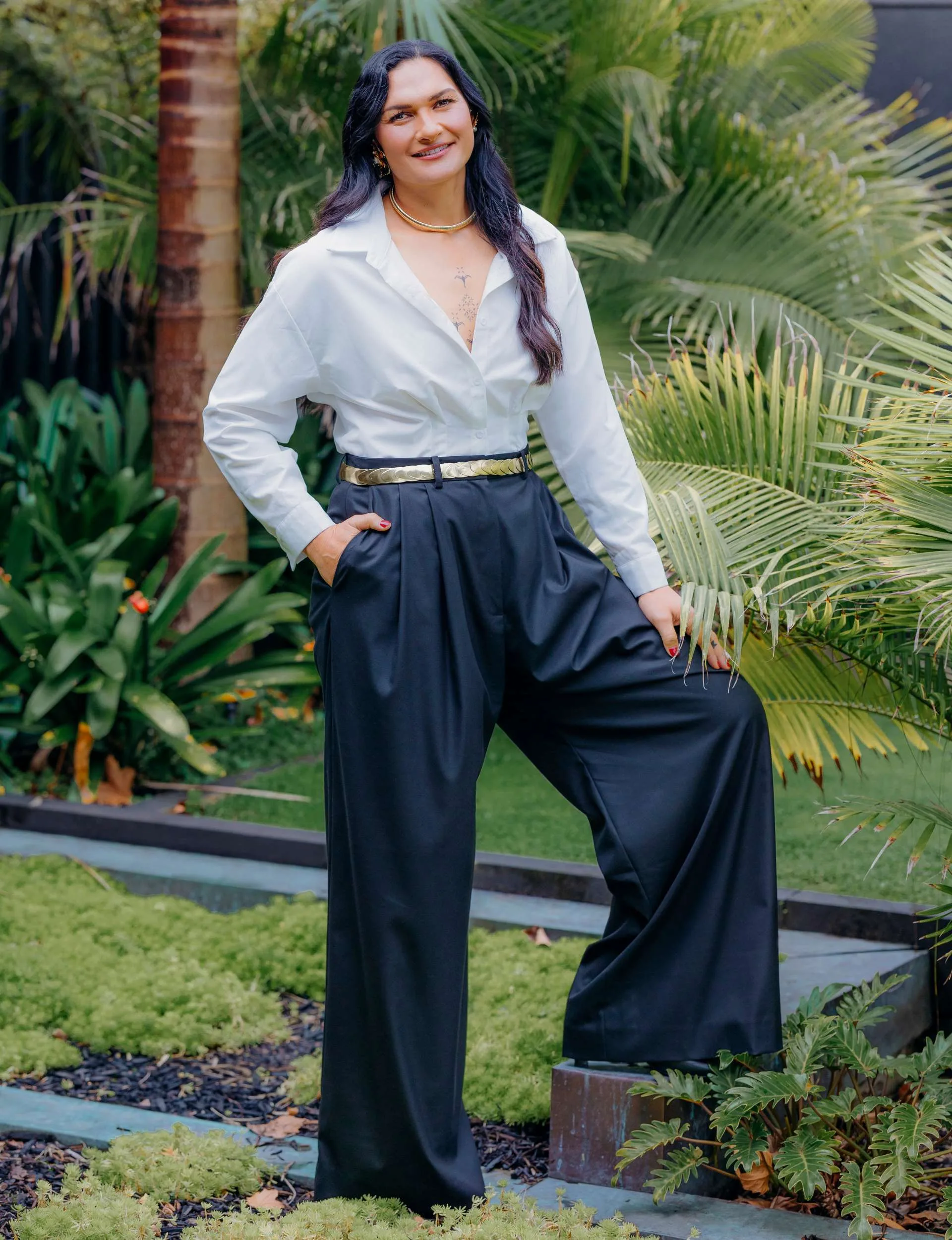 Valerie standing with one foot up to the side