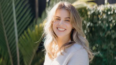 Traitors winner Bailey Kench smiling over her shoulder