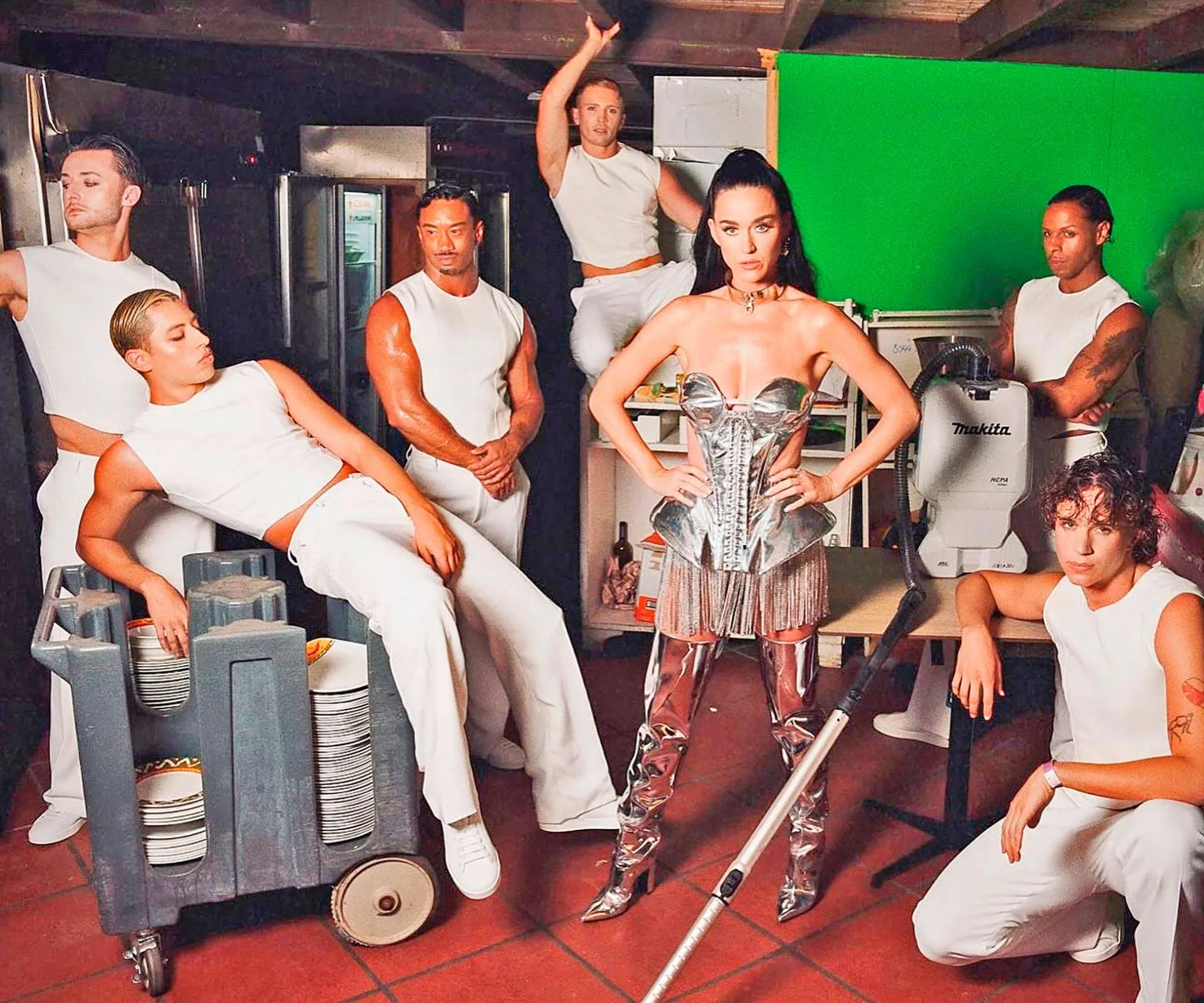 Katy Parry surrounded by her dancers, one of which is Michael