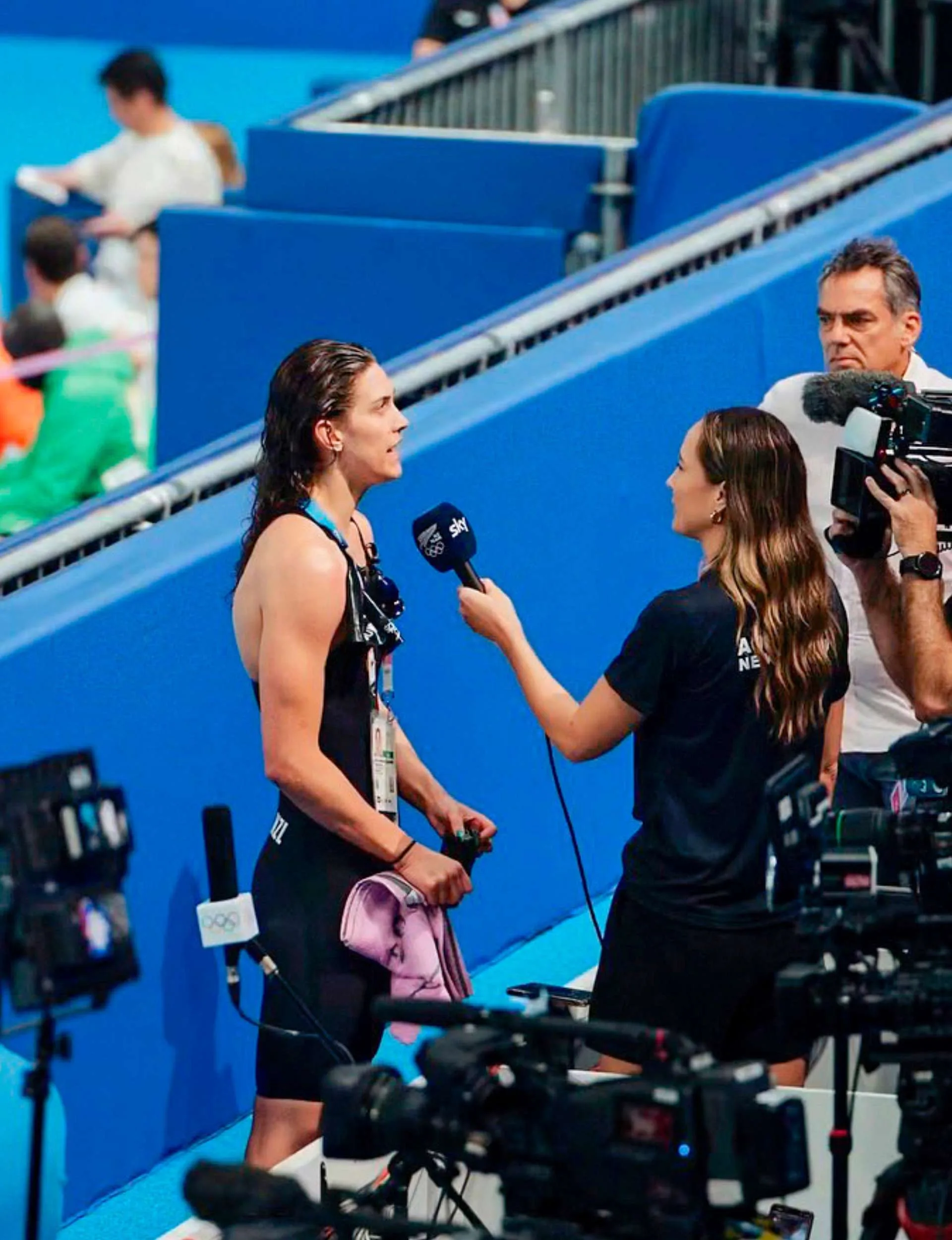 Poolside in Paris, interviewing Kiwi swimmer Hazel Ouwehand after her race
