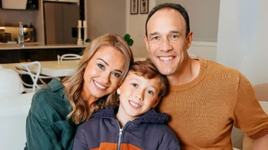 Logan Swann with his wife Jennifer and son Cole
