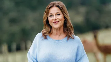 Sarah Bradley smiling on a farm