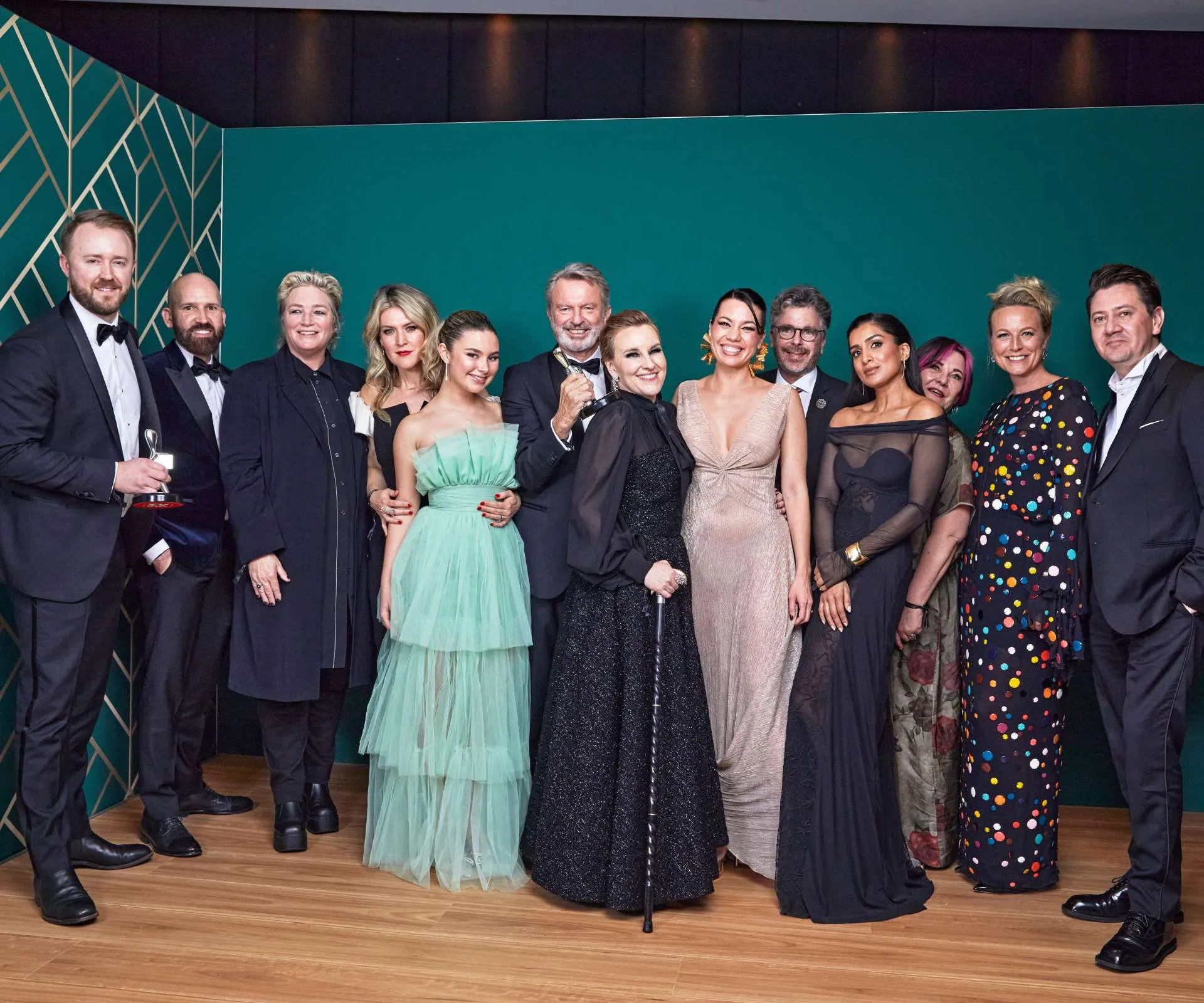 Sam Neill with the The Twelve cast after his win