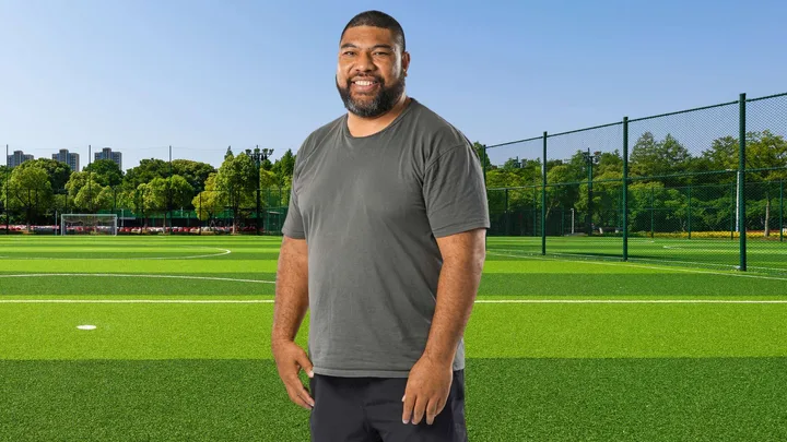 Lesley Vainikolo standing on a field