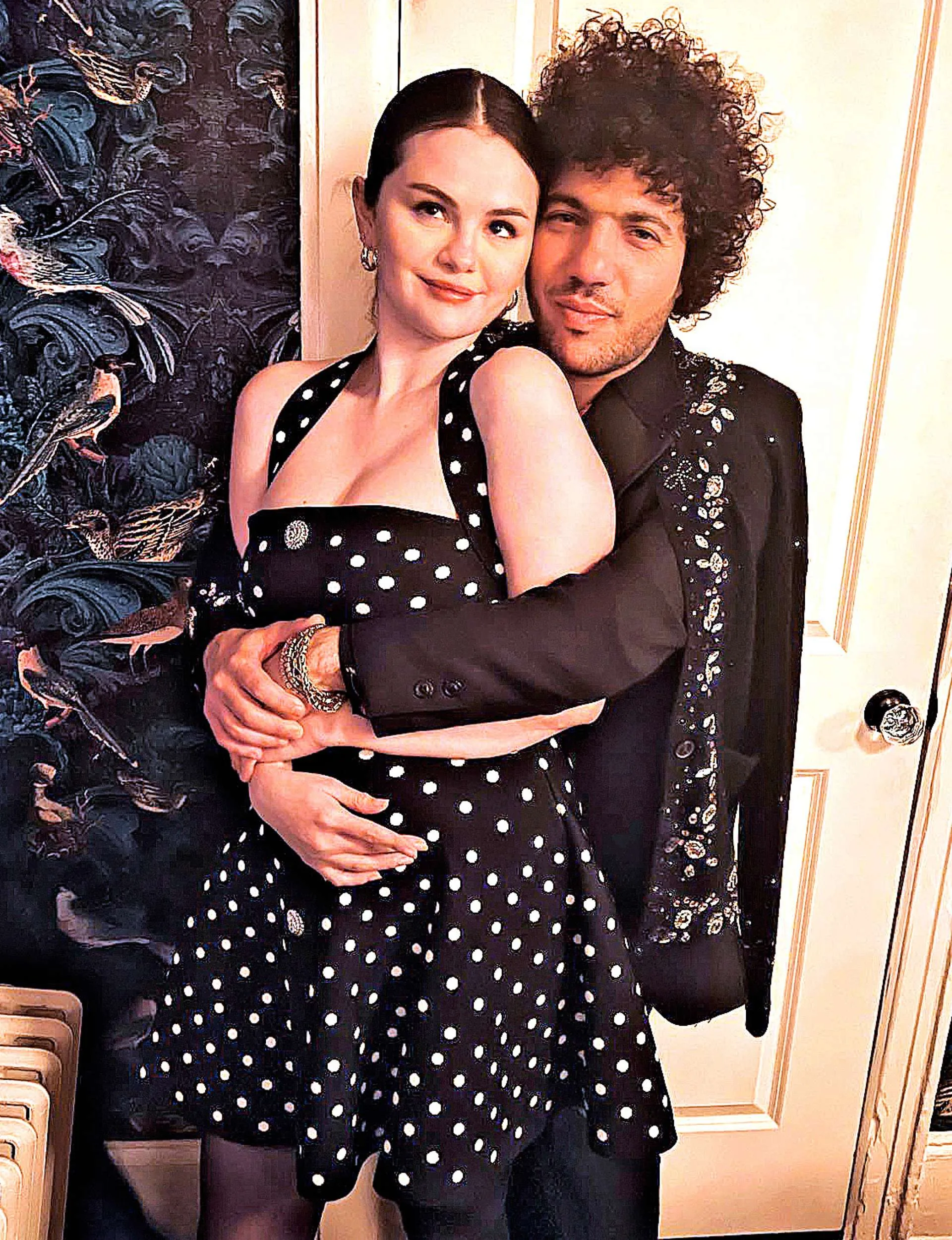 Only Murders In The Building star Selena Gomez with partner Benny Blanco standing behind her, hiding her hand