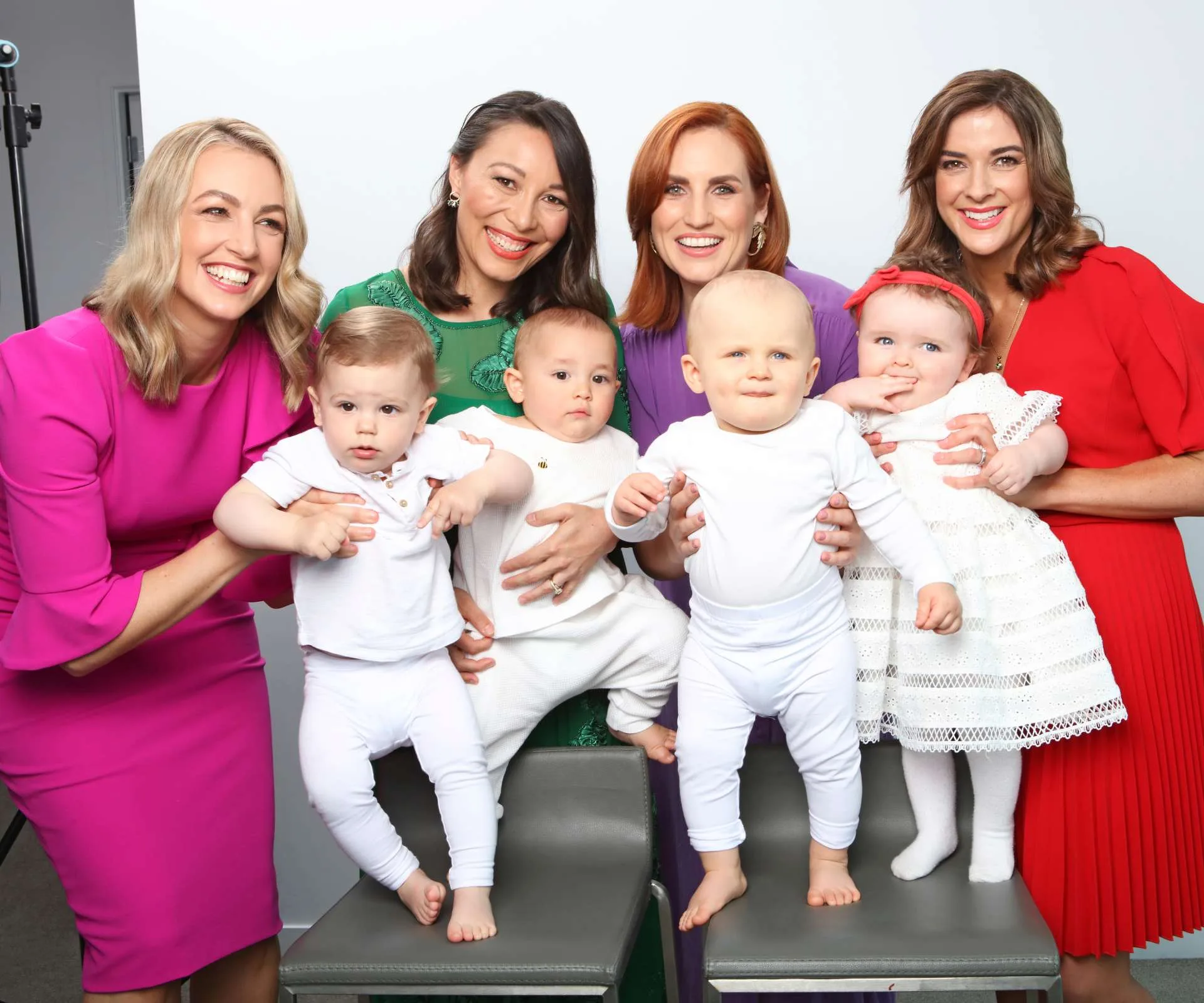 The Newshub women holding their babies, all close in age