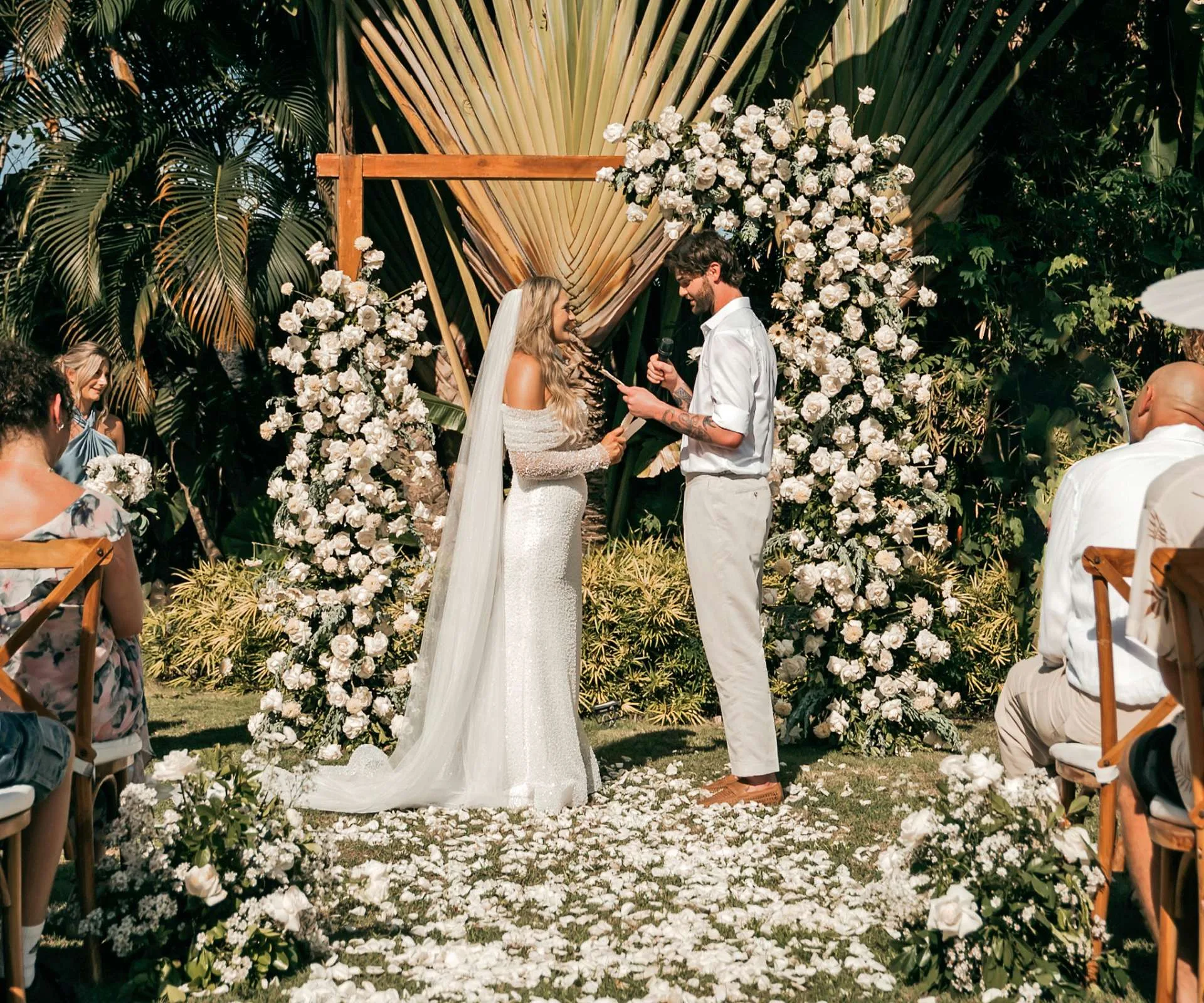 Georgina and Brayden sharing vows at their wedding