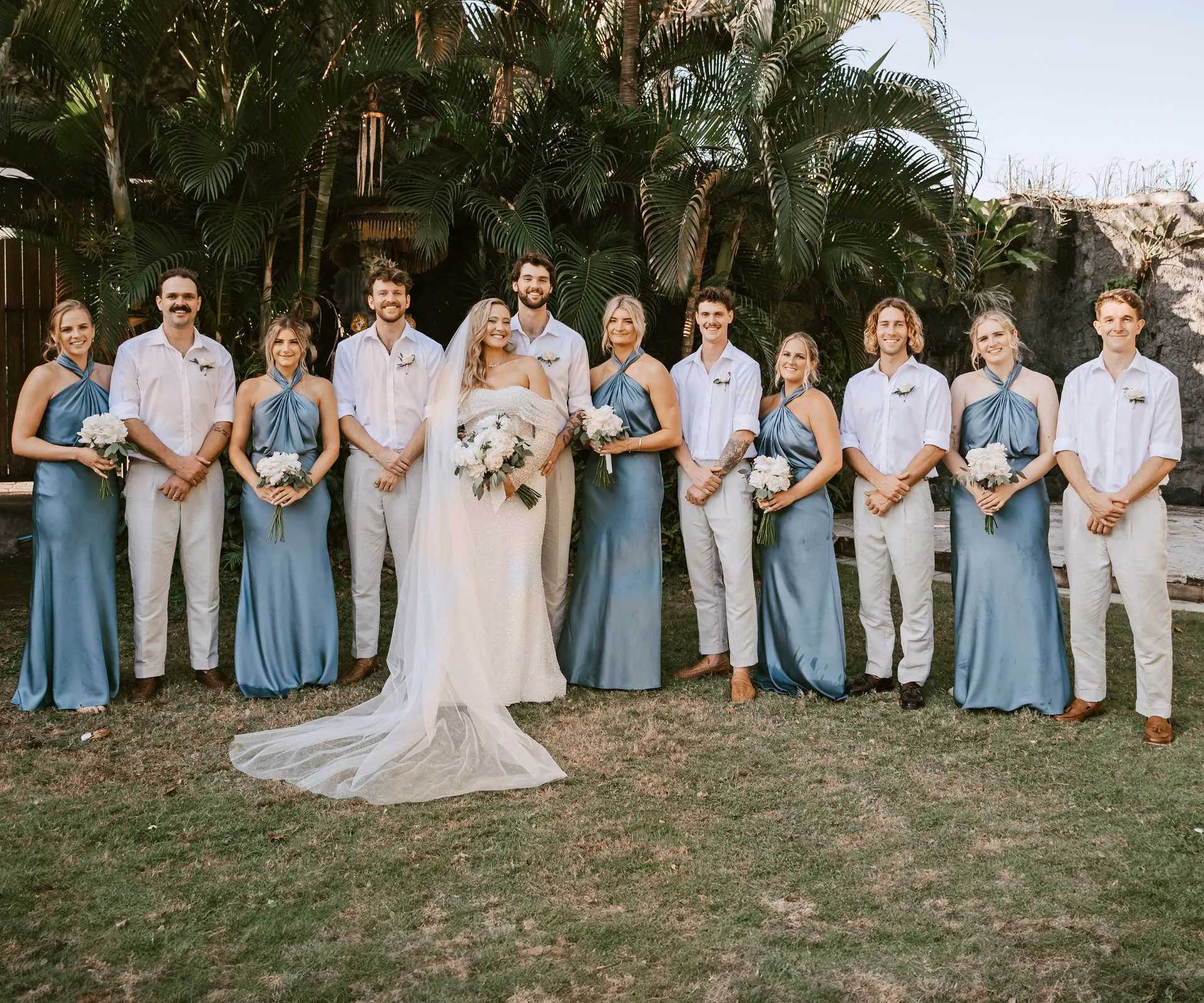 Brayden Inger and Georgina Fisher with their bridal party and groomsmen