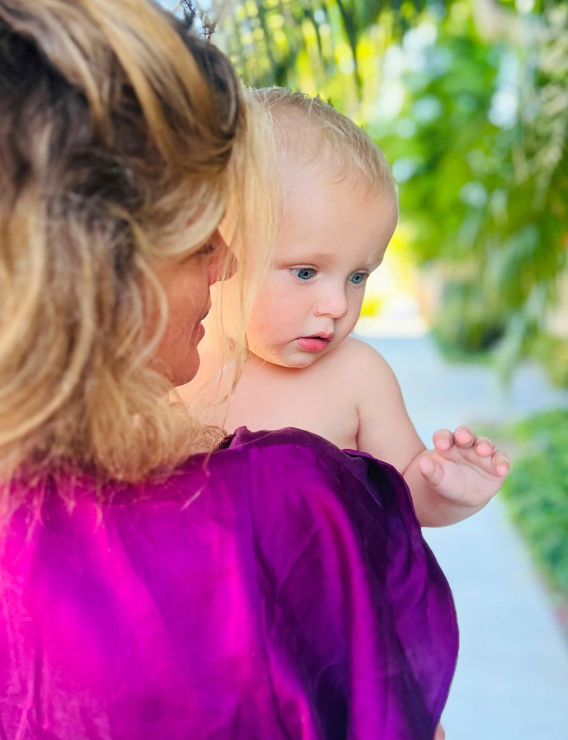 Rachel holding her grandson