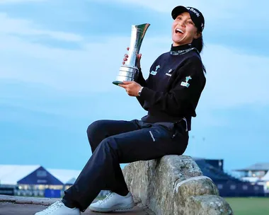 Lydia Ko holding a trophy